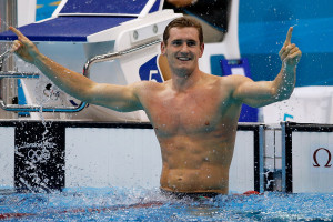 LONDON, ENGLAND - JULY 29: Cameron van der Burgh of South Africa celebrates after winning the gold in the Men's 100m Breastsroke final on Day 2 of the London 2012 Olympic Games at the Aquatics Centre on July 29, 2012 in London, England. (Photo by Jamie Squire/Getty Images)